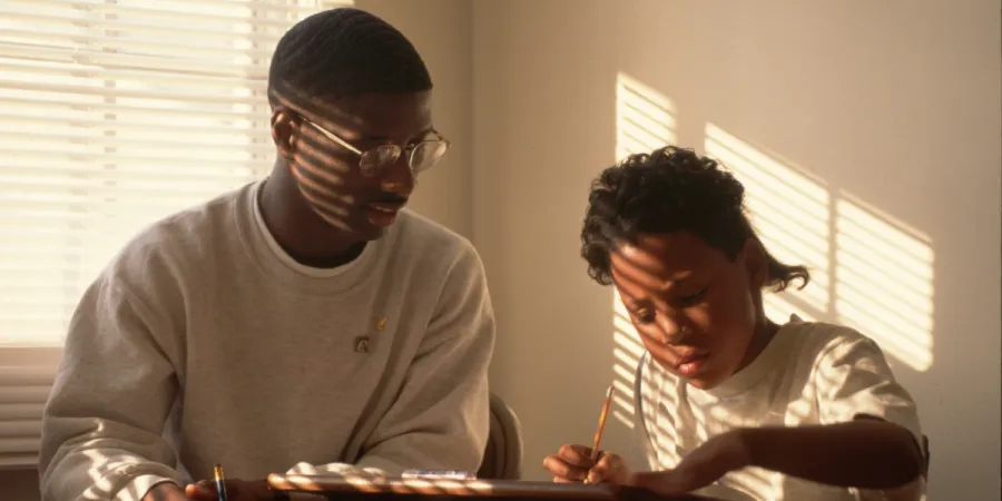 Older and Younger Child doing work